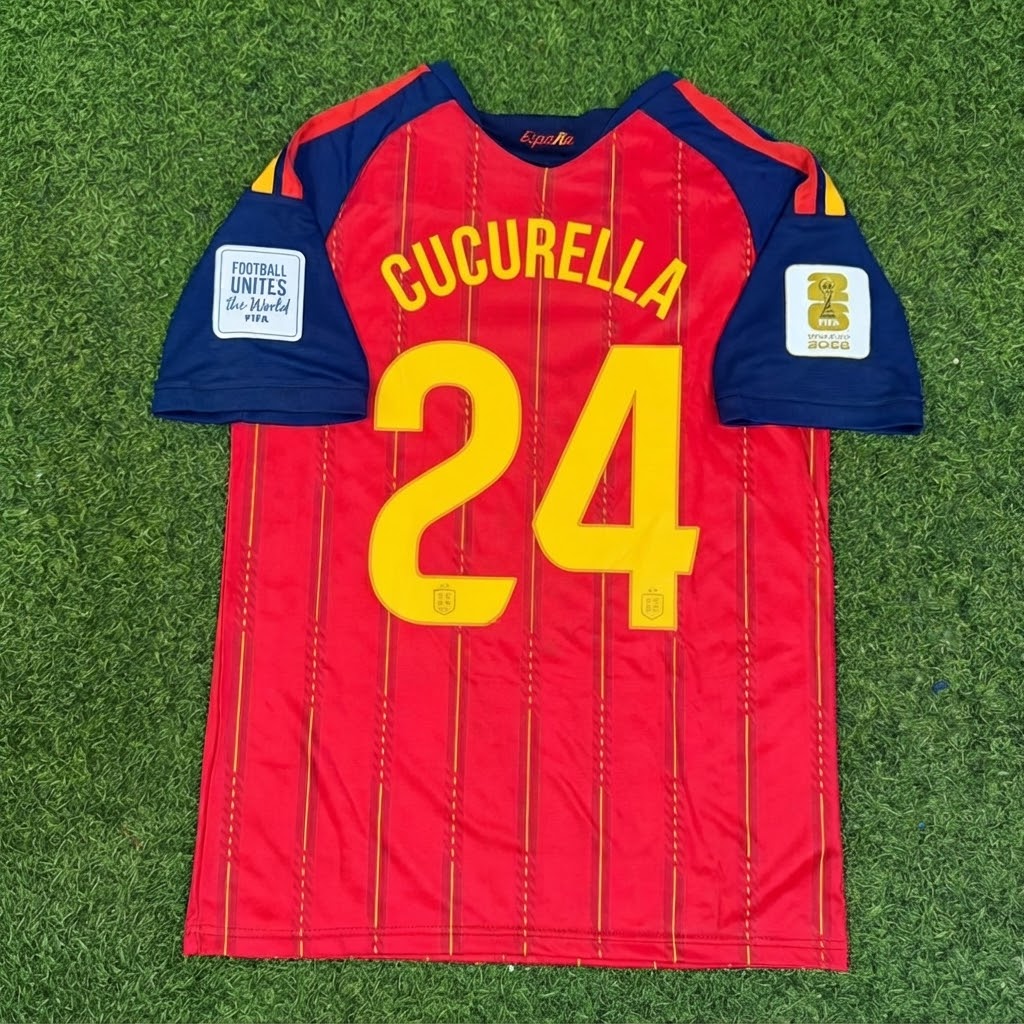 Marc Cucurella #24 Spain Two Star 2026 World Cup Champions Home Football Jersey